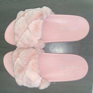 Pink furry slippers
